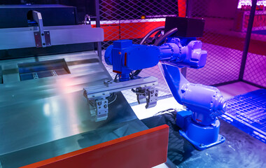 automatic machine tool roboti arm in industrial manufacture factory,Smart factory industry 4.0 concept.