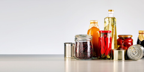 Donation food. Different types of canned food with copy space.