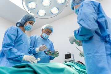 Medical Team Performing Surgical Operation in hospital operating. Medical team doing critical operation.