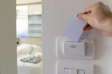 Hand insert key card.