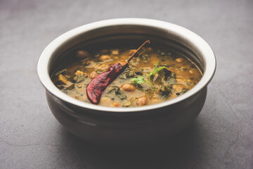 Dal Palak or Lentil spinach curry - popular Indian main course healthy recipe - obrazy, fototapety, plakaty