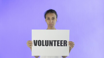 Afro-American Girl Activist With Volunteer Poster on Violet background