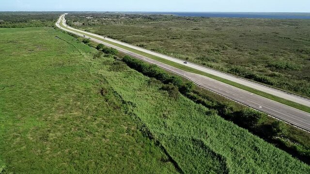 Traffic moves along State Route 520 in Cocoa, Florida.
