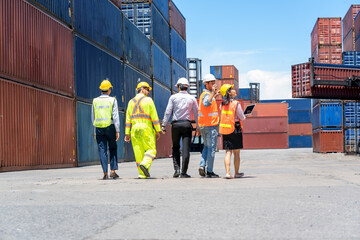 Group of professional dock worker and engineering people working at Container cargo,Import and Export concept.