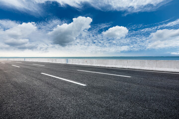 Fototapeta premium Empty asphalt road and beautiful sky with river.