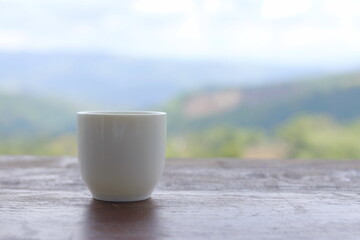glass of milk on wooden table