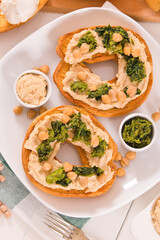 Friselle with turnip tops and hummus.
