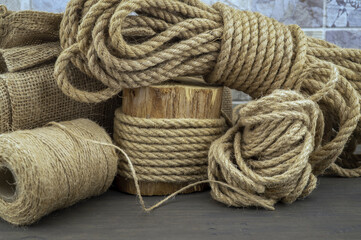 Jute rope and spools of burlap threads or twine