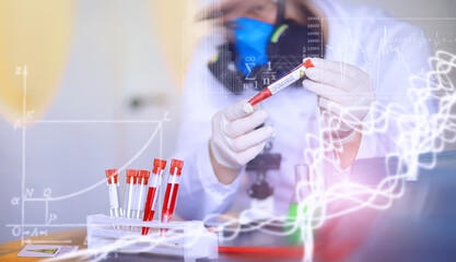 Background researcher in the laboratory is testing drugs for the treatment of viral pneumonia. Coronovirus blood test of infected patients. World pandemic.