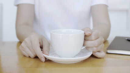 woman with cup of coffee