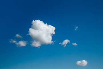 White, Fluffy Clouds In Blue Sky. Background From Clouds