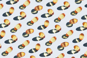 Yellow omega 3 capsule pattern. Different gold pills. Medical horizontal banner. Cosmetology...