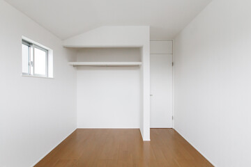 Interior view of a new house, white walls and wooden floor