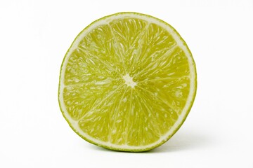 Bright juicy sour lime on a white background cut in half.