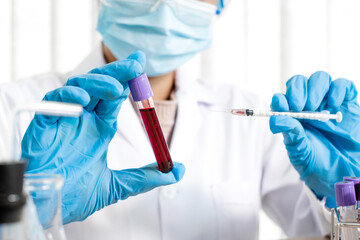 Professional doctors perform find virus tests from samples of blood tests to diagnose coronary virus infections analysis and sampling of infectious