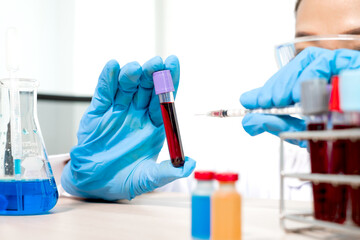 Professional doctors perform find virus tests from samples of blood tests to diagnose coronary...