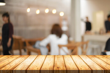 cofee shop blurred background with wooden desk space montage.