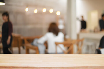 cofee shop blurred background with wooden desk space montage.