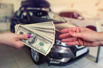 Buying a new car. The buyer and seller enter into an agreement to buy or lease a car
