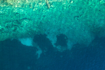 Obraz premium Abstract background of turquoise water-aerial view