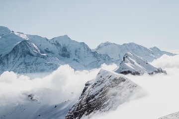 snow and fog white mountain in the French Alps