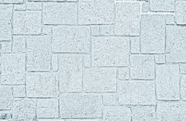 Background from bright paving stones. Irregular natural stones.