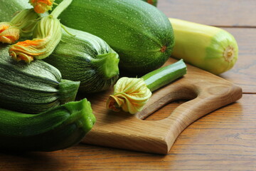Fresh organic zucchini on the wooden table