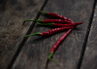 Red chilli on dark tone.