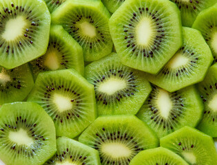 Close-up photo of a sliced kiwi without it's skin.