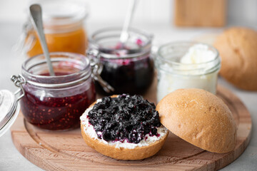 round bun with homemade blackberry jam