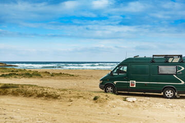 Fototapeta na wymiar Camper van on beach in Spain.