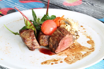 Steak with vegetables on a plate