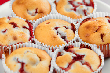 Homemade strawberry muffins closeup, summer dessert
