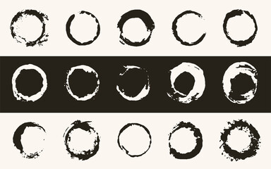Set of hand drawn circles on a black and white background. Templates for design. Rounded shapes with spots in grunge style. Ink splatter.