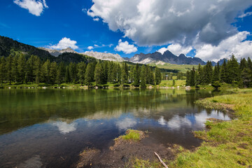 Summer view of San Pellegrino lake in San Pellegrino pass: a high mountain pass in the Italian Dolomites