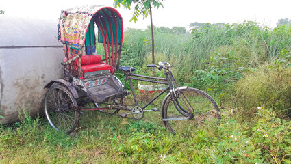 Fototapeta na wymiar The cycle rickshaw is a small transport. Cycle rickshaws are human-powered by pedaling