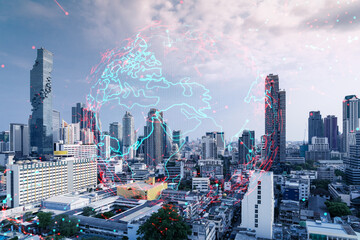 World planet Earth map hologram over panorama city view of Bangkok, Asia. The concept of international connections and business. Multi Exposure.