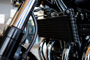 closeup radiators of bigbike motorcycles with soft-focus and over light in the background