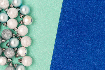 Set of Christmas balls on a colorful glowing textured background. Creative concept with place for your text.