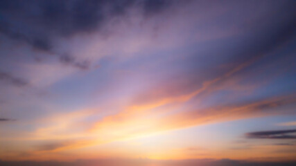 Naklejka na ściany i meble Blur image for background: sunset sky and clouds
