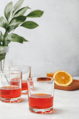 Aperol spritz cocktail in glass with oranges. Summer italian fresh alcohol cold drink