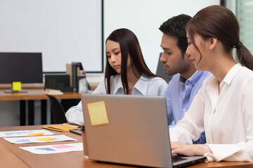 Obraz premium Asian business man and women meeting and talk about job in office.