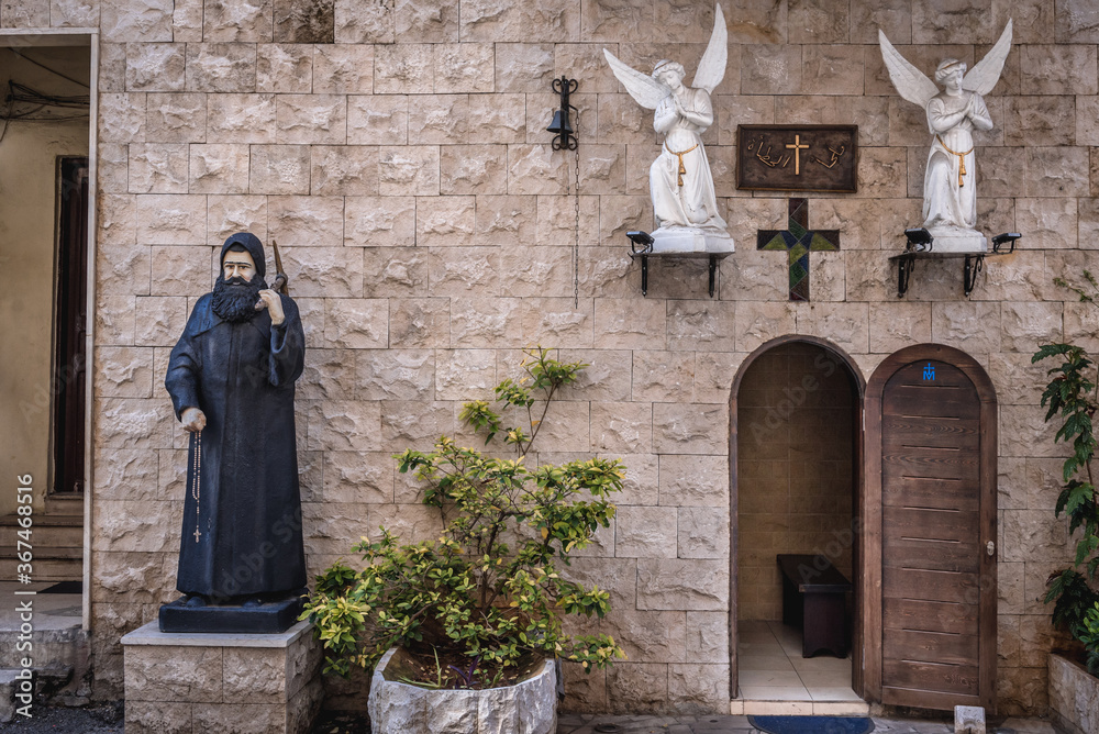 Sticker St Anthony statue in front of small Maronite chapel in Sin el Fil city, suburbs of Beirut, capital of Lebanon