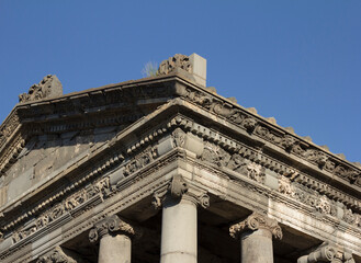 Fototapeta premium Ancient Greek stone roof and columns with ornaments