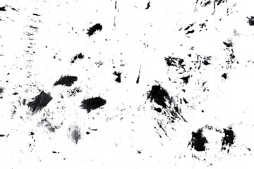 Abstract drops and smears of black acrylic paint isolated on a white background.