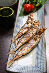 A Plate Of Roasted Capelin Fish