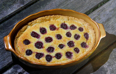cherry pie on a wooden table