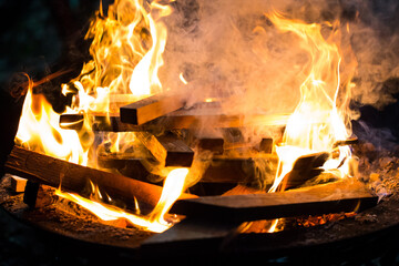 bonfire fire from wooden planks
