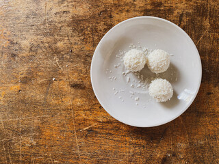 coconut candy on a white plate