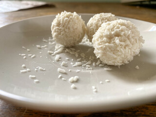 coconut candy on a white plate